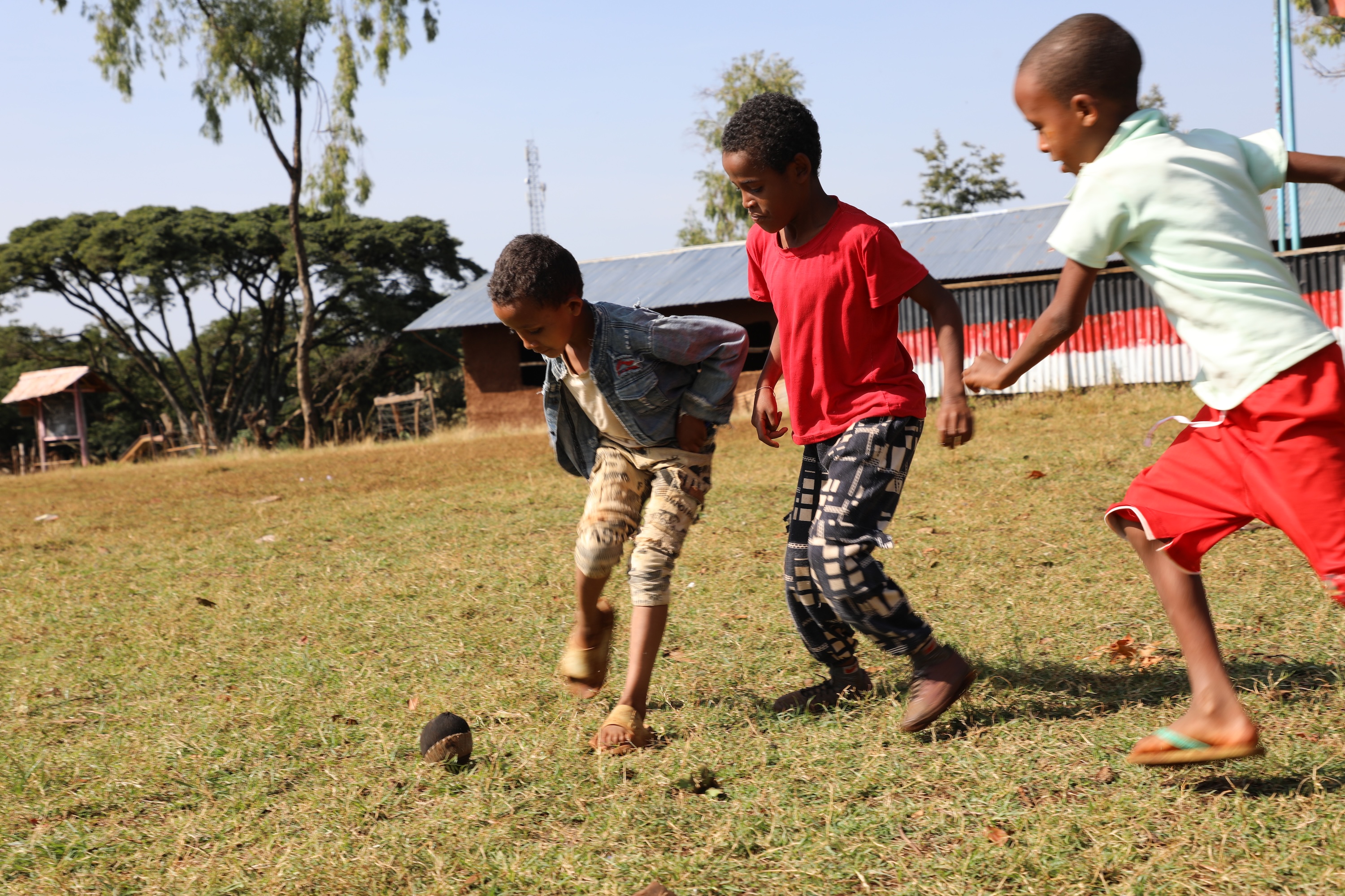 Abdi playing with his friends