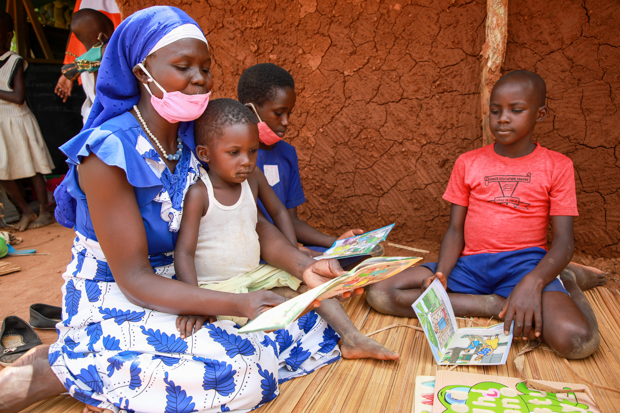 World Vision Uganda supports reading through community literacy centres.