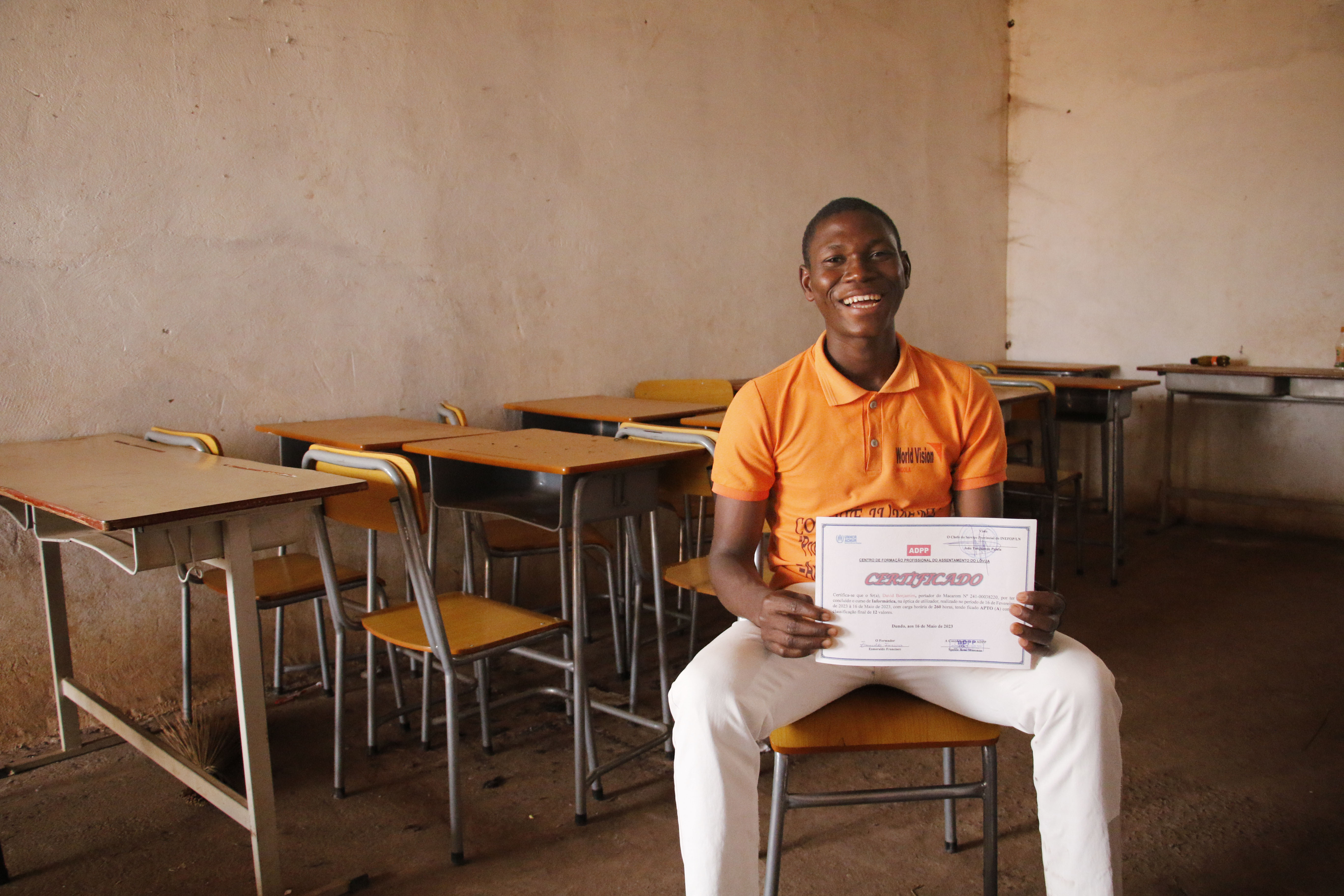 David proudly shows his IT certificate