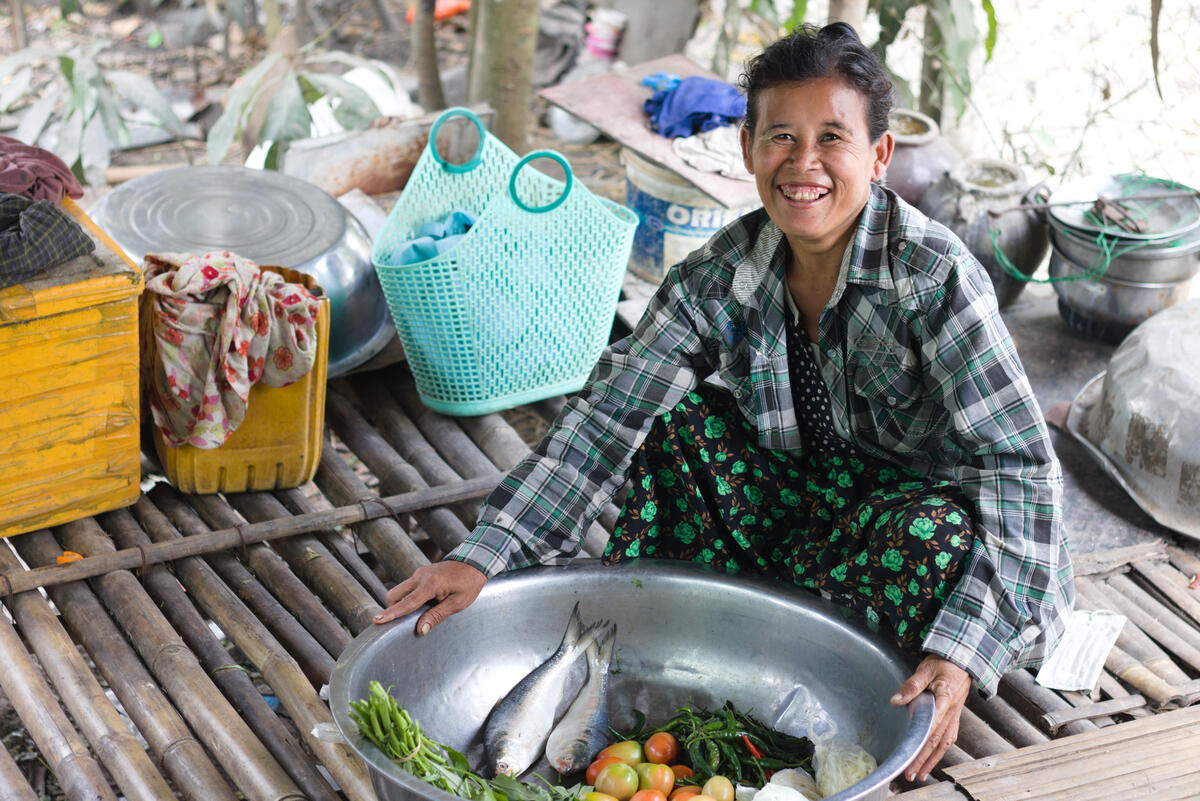 San San with nutritious fish and vegetables in Cambodia.