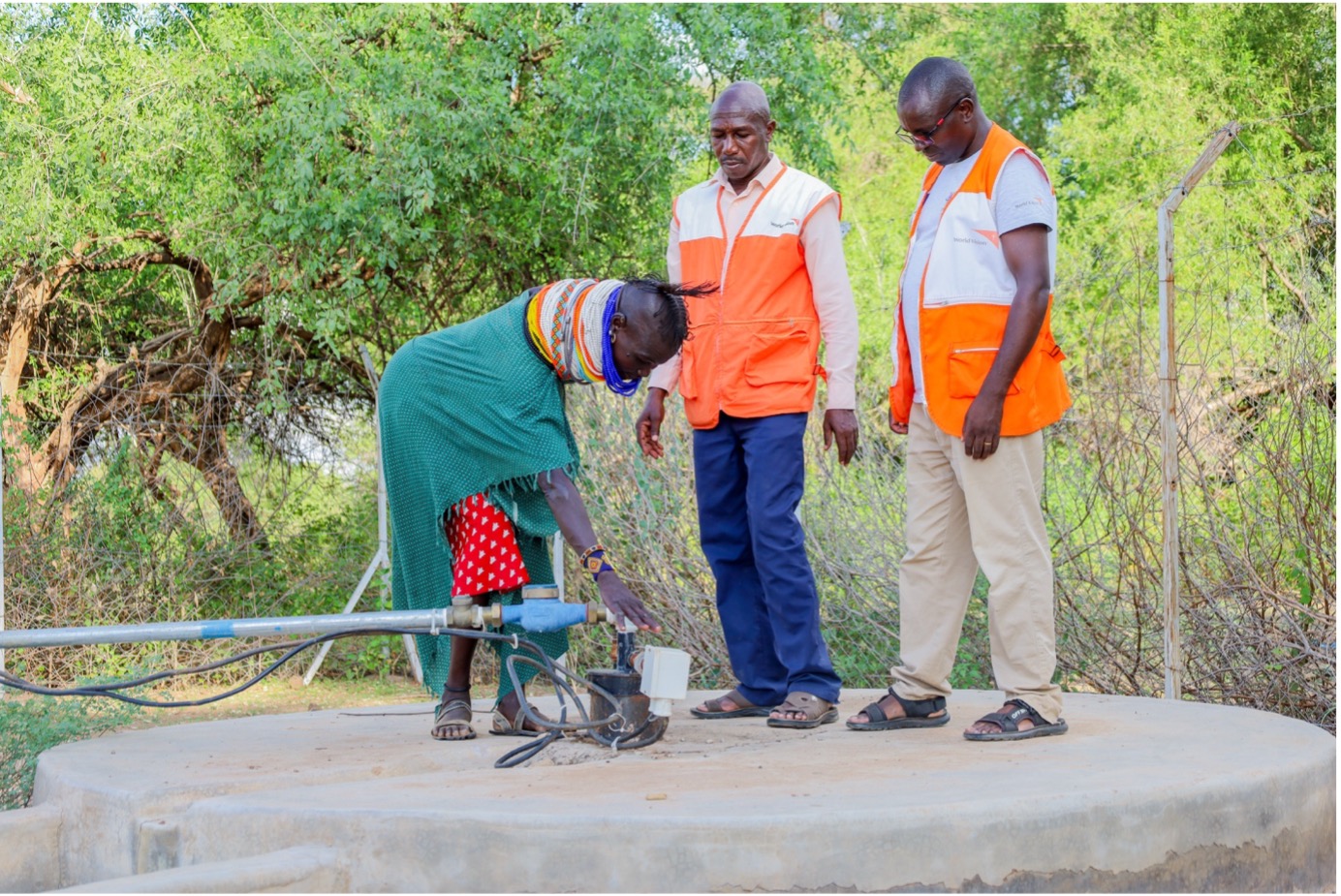 Women in Nakechurtak village using the modern solar water pump, which serves over 100 households and has greatly simplified water fetching. © World Vision Photo/Felix Pilipili