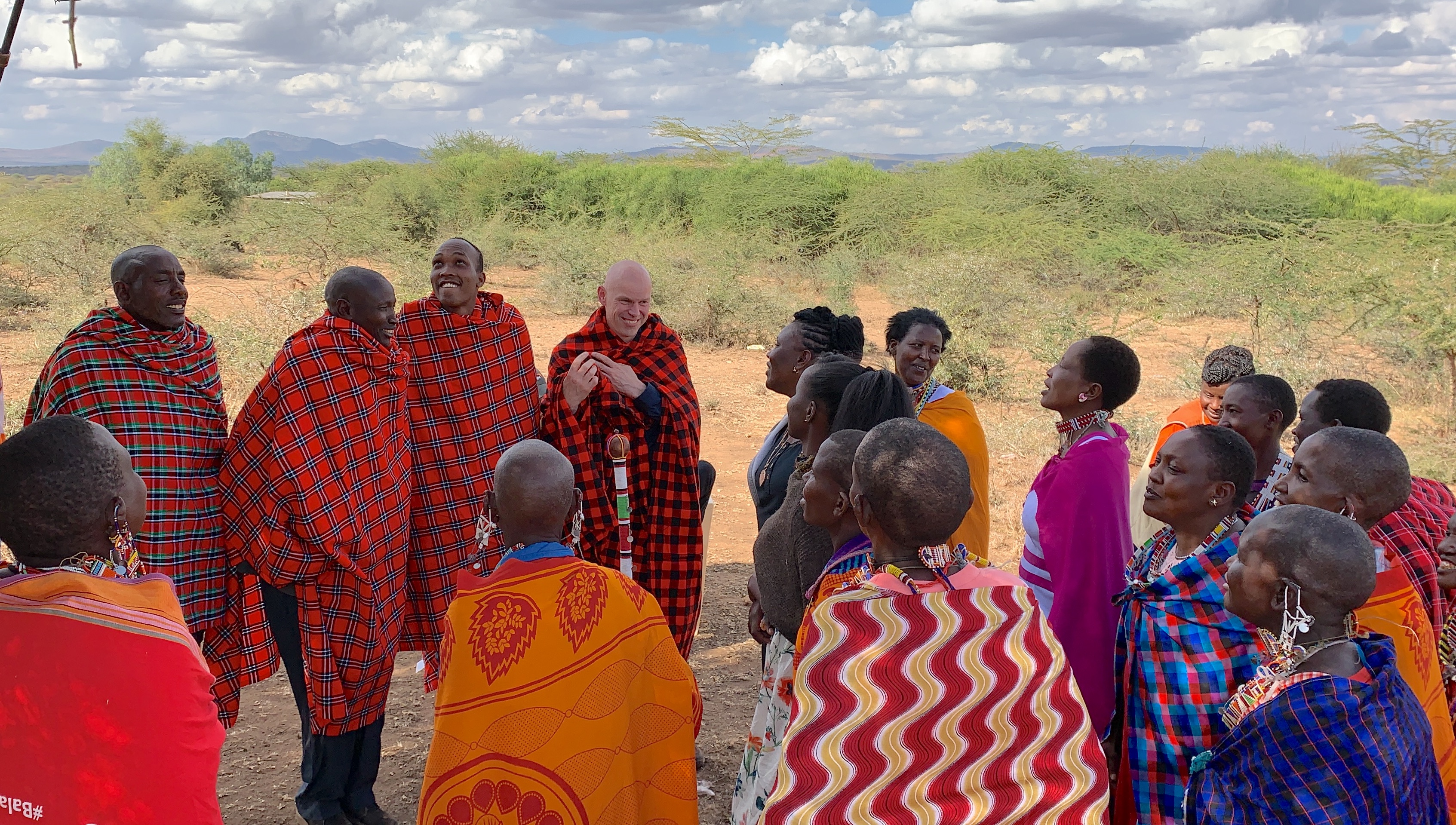 Andrew Morley, World Vision International President & Chief Executive Officer (CEO) interacts with communities in Kajiado County during a past visit. These men and women have been empowered to shun retrogressive cultural practices like FGM & child marriage through community dialogue forums supported by World Vision and UNICEF Kenya. ©World Vision Photo