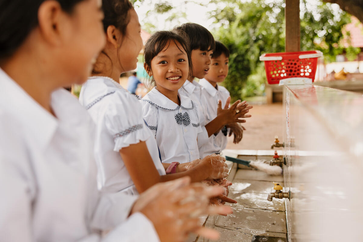 Girls washing their hands