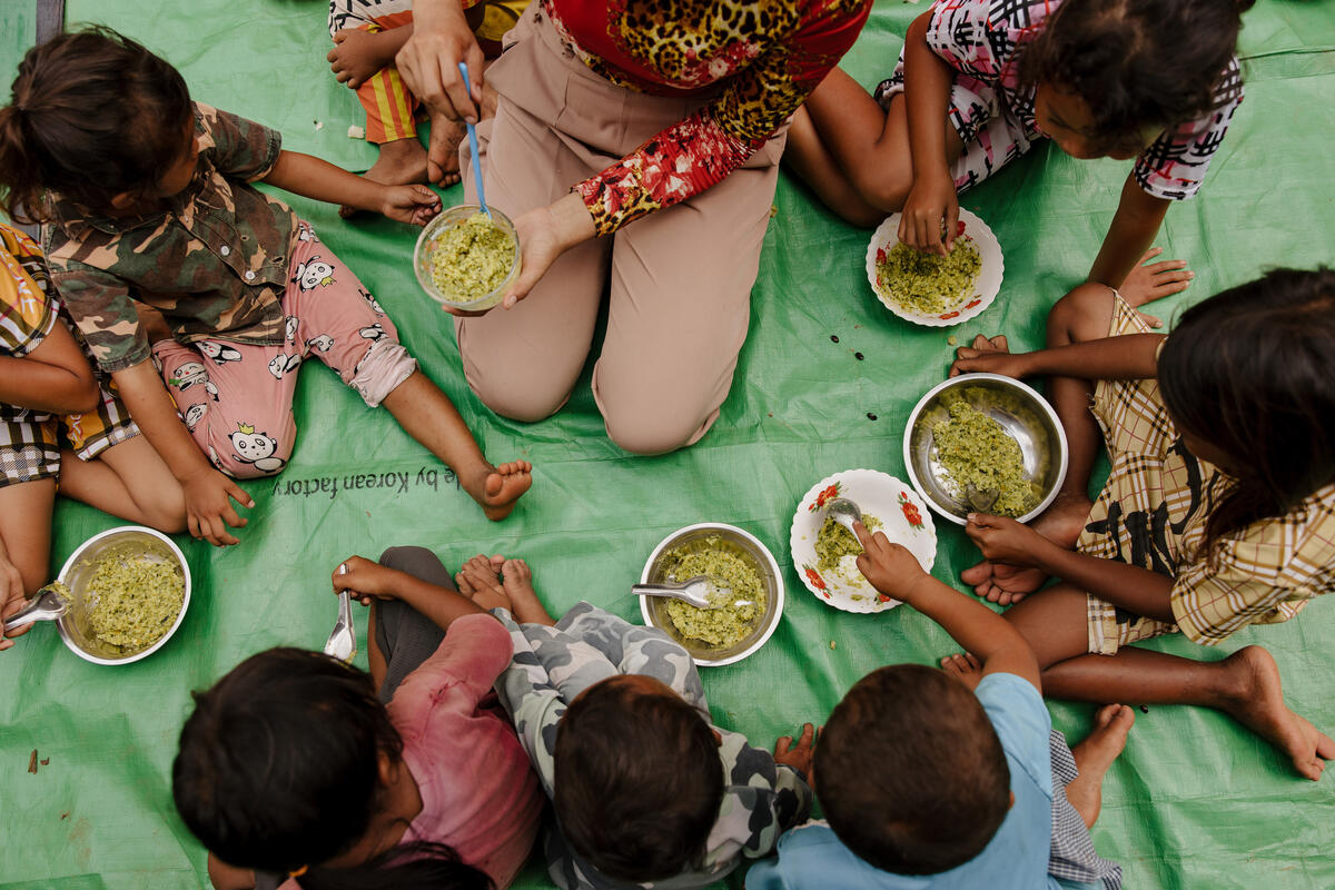 Children gathering over food
