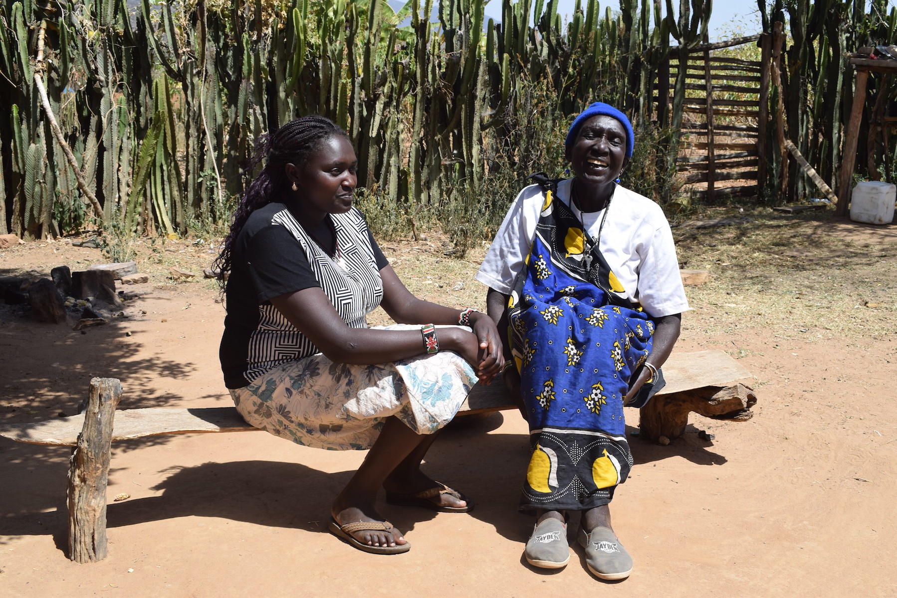 Chepurai (right) with her grand-daughter. She  stopped circumsicing girls after learning about its health hazards from World Vision in Kenya. @World Vision/Photo by Sarah Ooko.