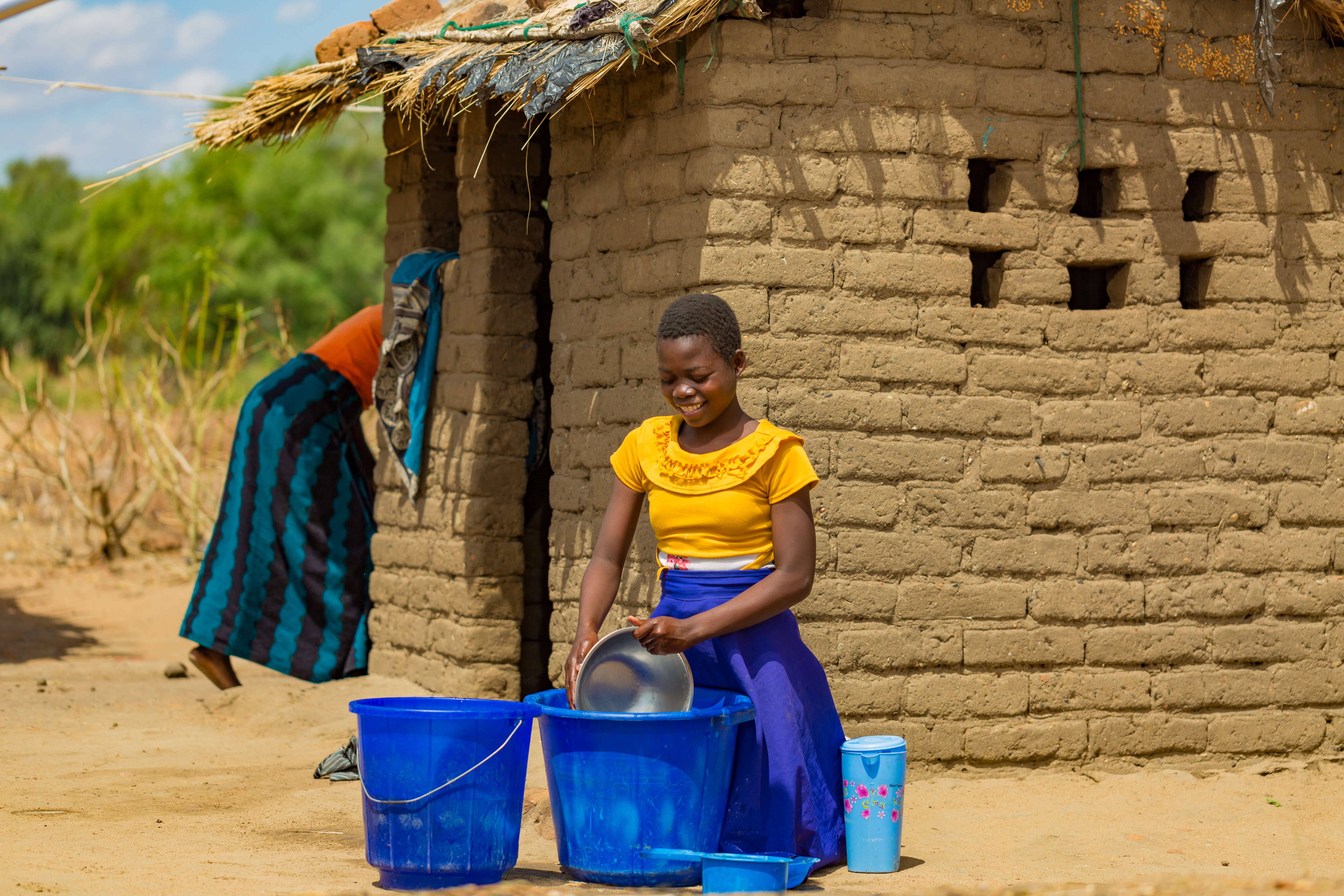 Chifundo uses the water for household chaus like washing dishes, washing clothes and bathing