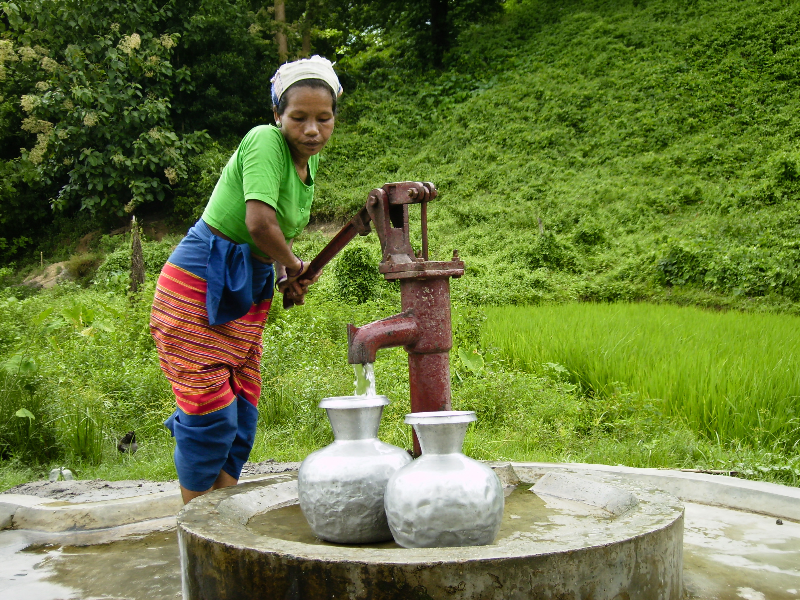 Women collecting water in the hills of rural Bangladesh.