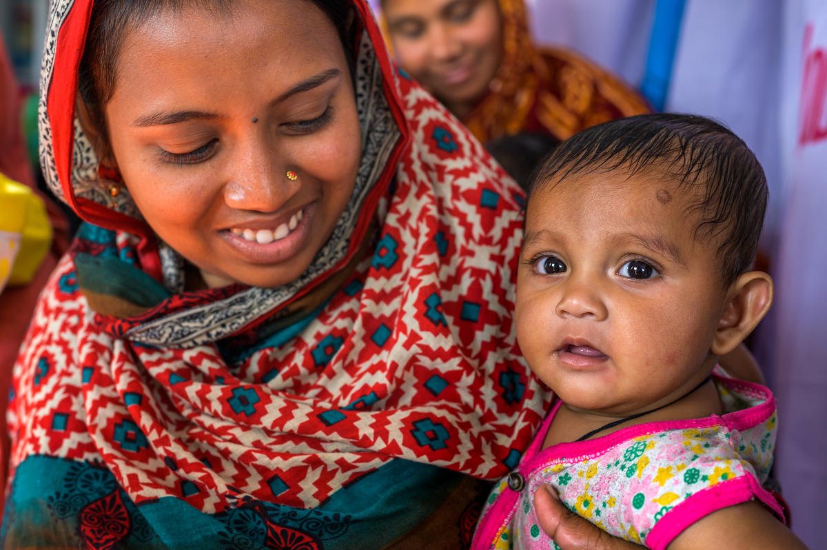 Mothers visit the clinic to access regular growth monitoring for their newborn babies.