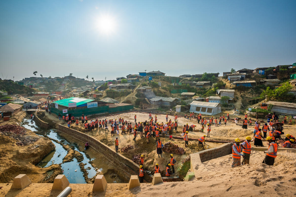 World Vision hired 14,922 refugees, including 1,906women, to construct roads, pathways and bridges to prepare for the monsoon season. The result: no lives were lost during the storms and flooding.