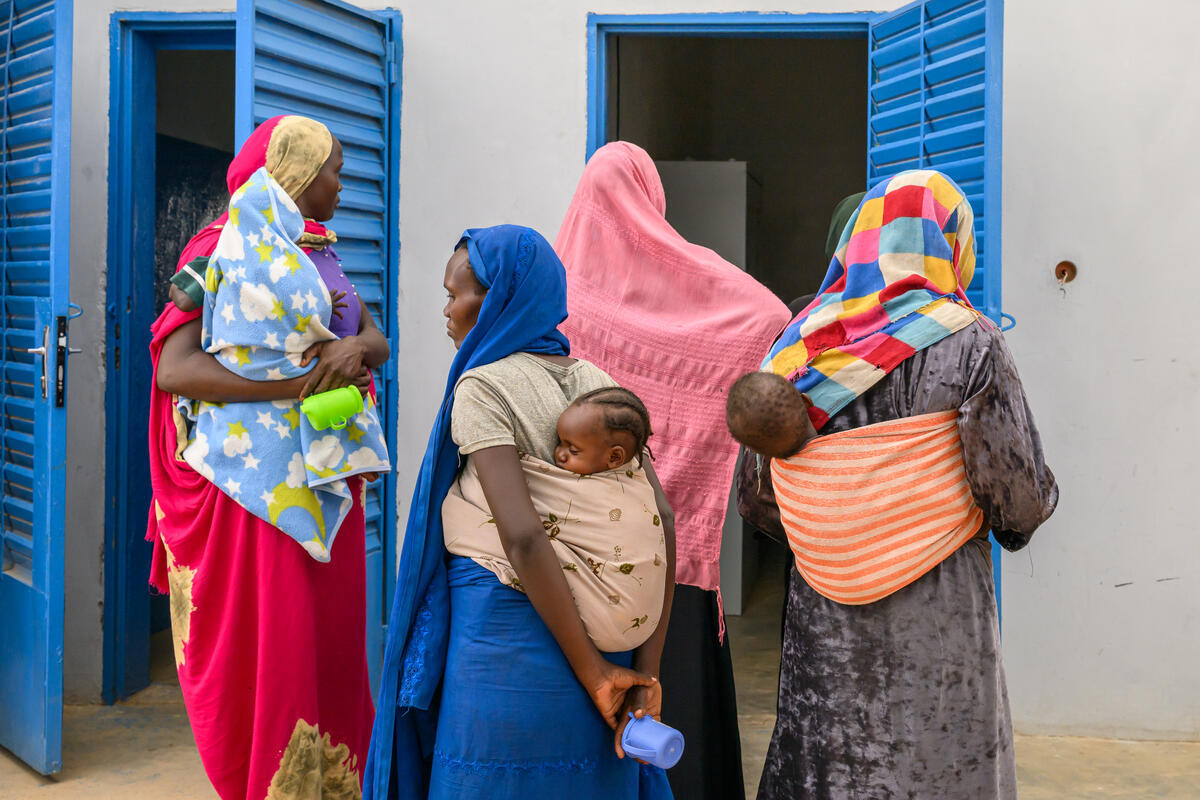 Mothers and children at the Farchana nutrition center.