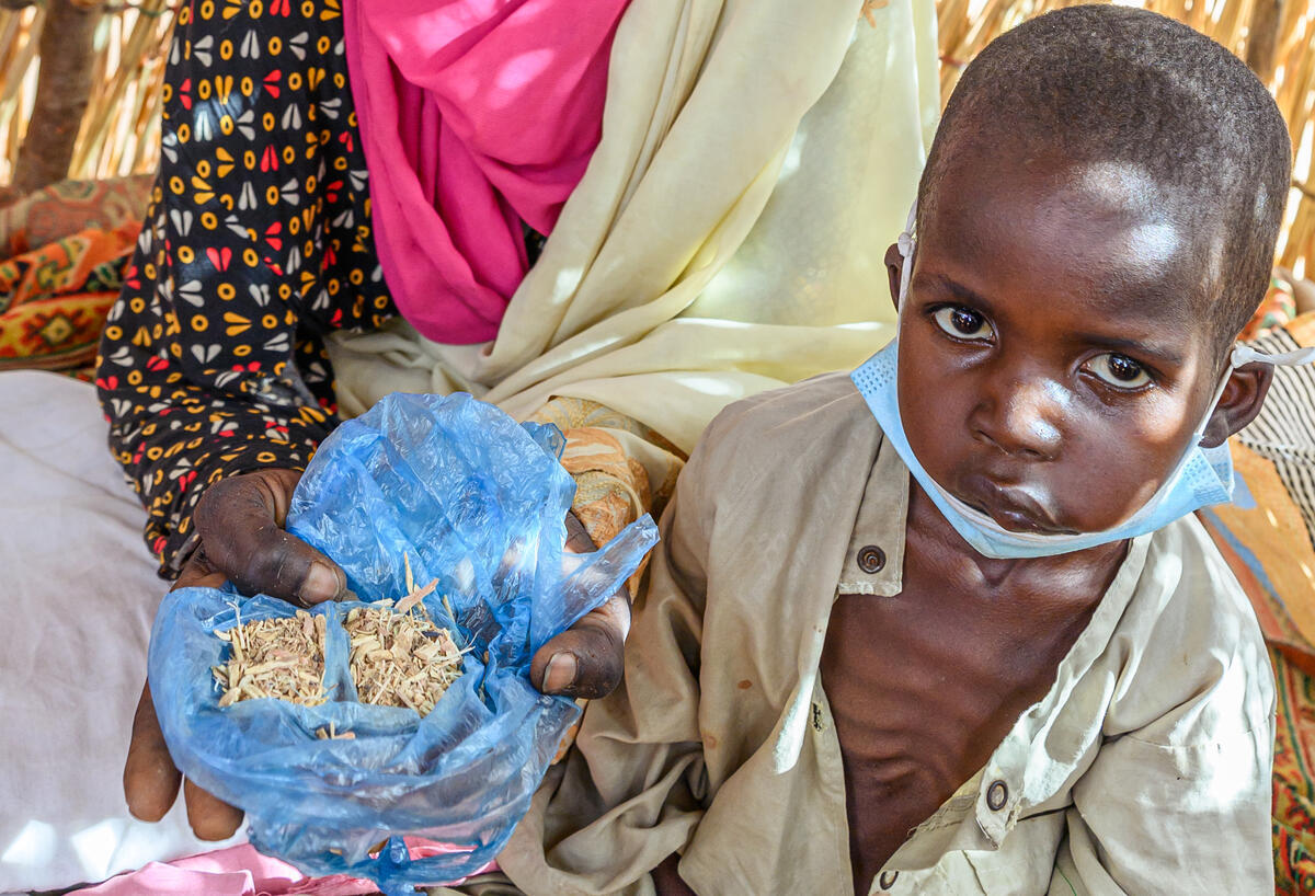 Adoum’s ribs show through his thin chest, and he has an infection in his mouth.