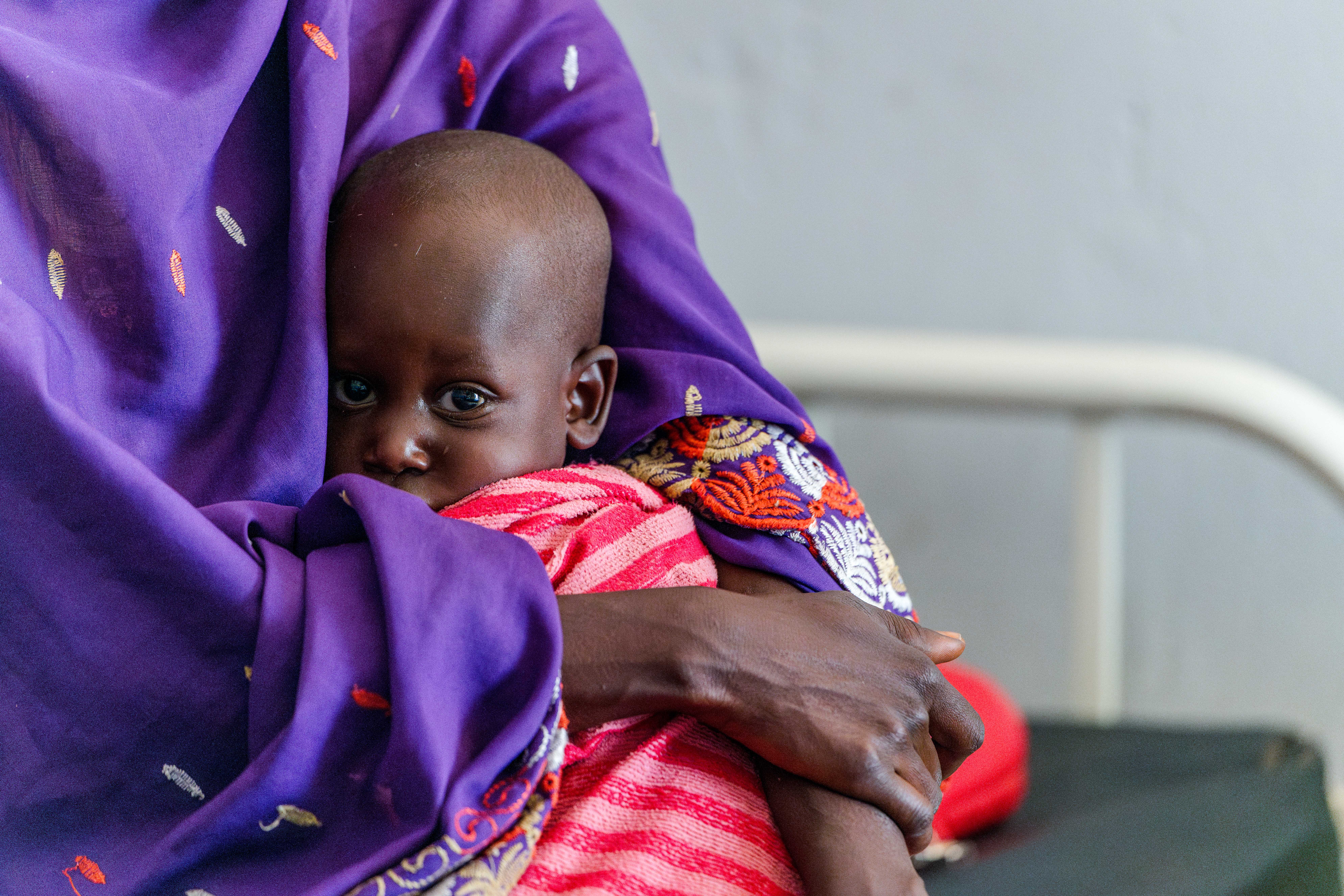 Fatima, 25, brings her 2 year old son to Farchana Nutrition & Rehabilitation Centre for his first clinic visit.