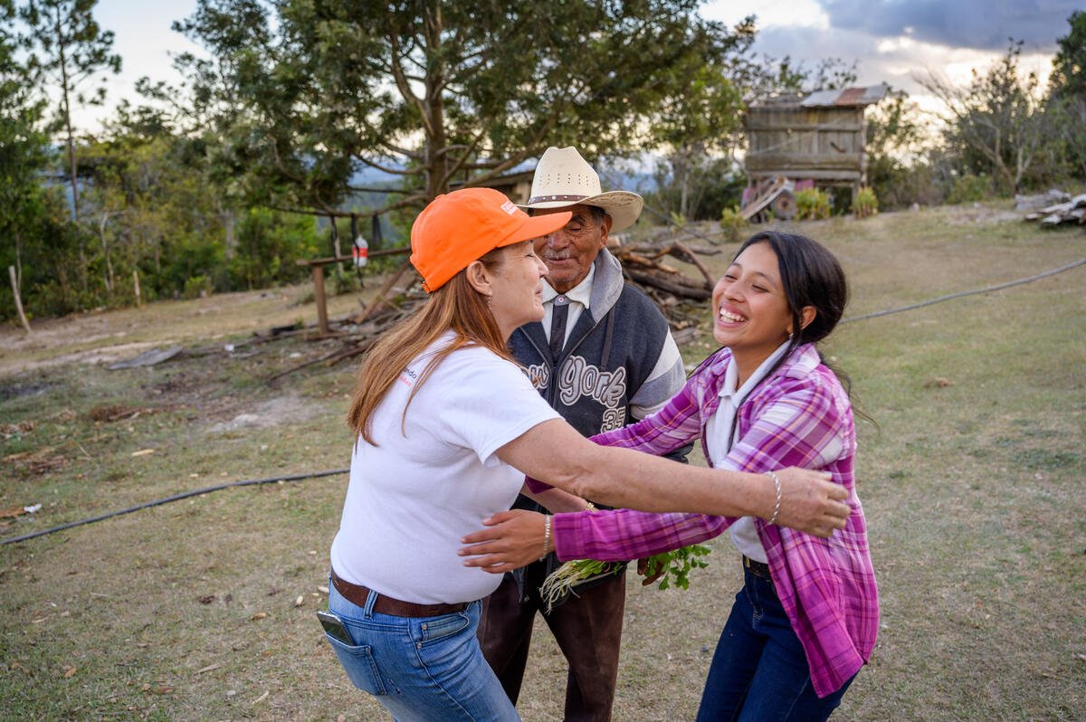 Nahomy with World Vision staff