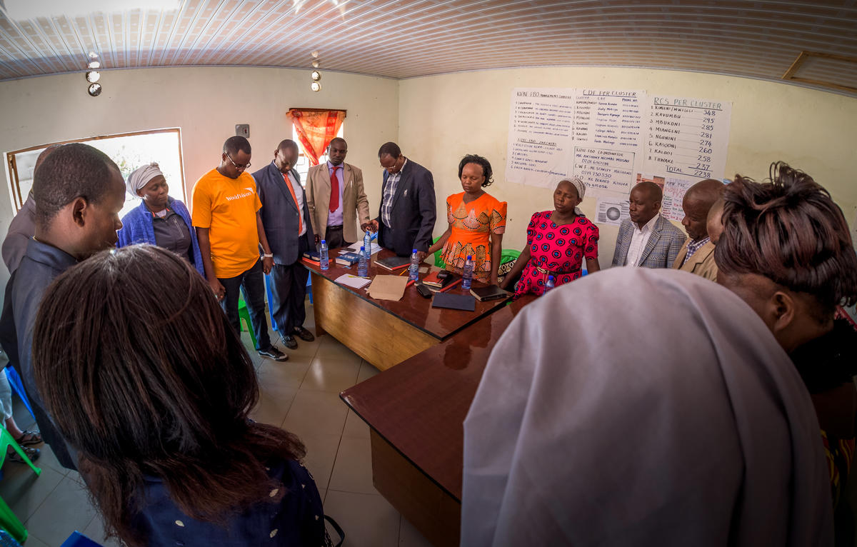 Prayer during a planning meeting