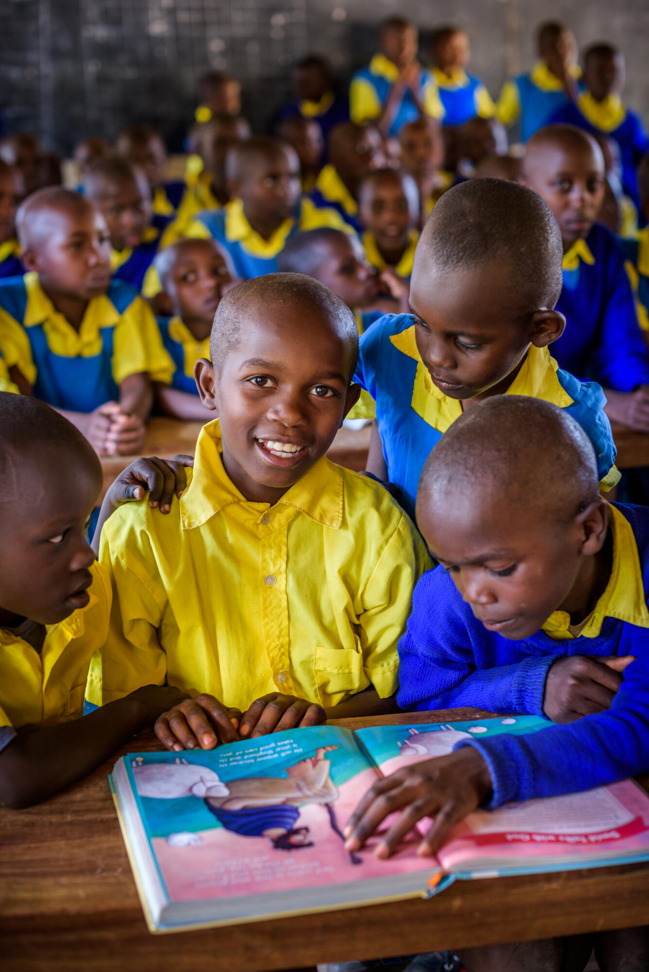 Nicholus, 10 (centre), and his classmates in Kalawa AP, Kenya.