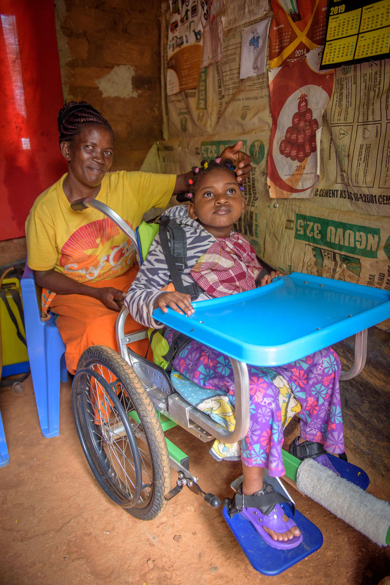 Cynthia enjoys her new wheelchair provided by USAID through the help of child sponsorship programme