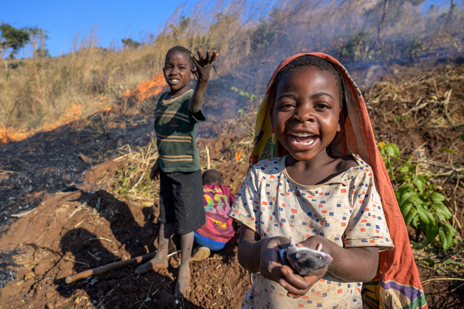 A moment of joy as Ireen and her cousins find mice for the family to cook and sell.\