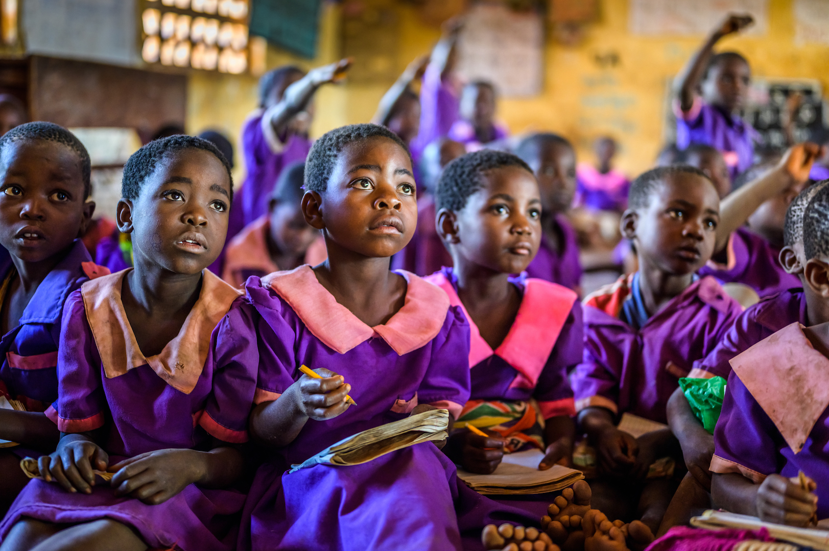 Ireen (center) is a serious student and top performer despite the challenges caused by the lack of water.