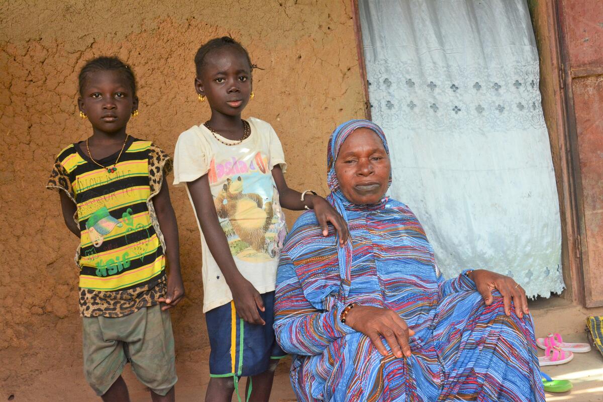 Aichata and her sister with their grandmother.