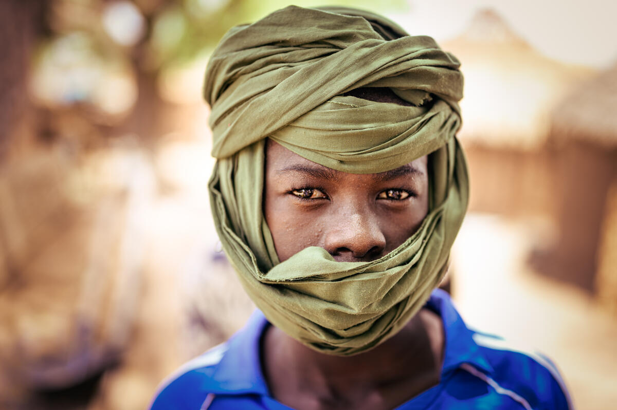 young girl wears a headscarf