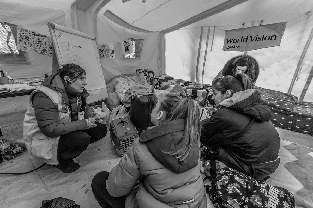 Mothers and children take a brea.k in World Vision's child play space in Romania