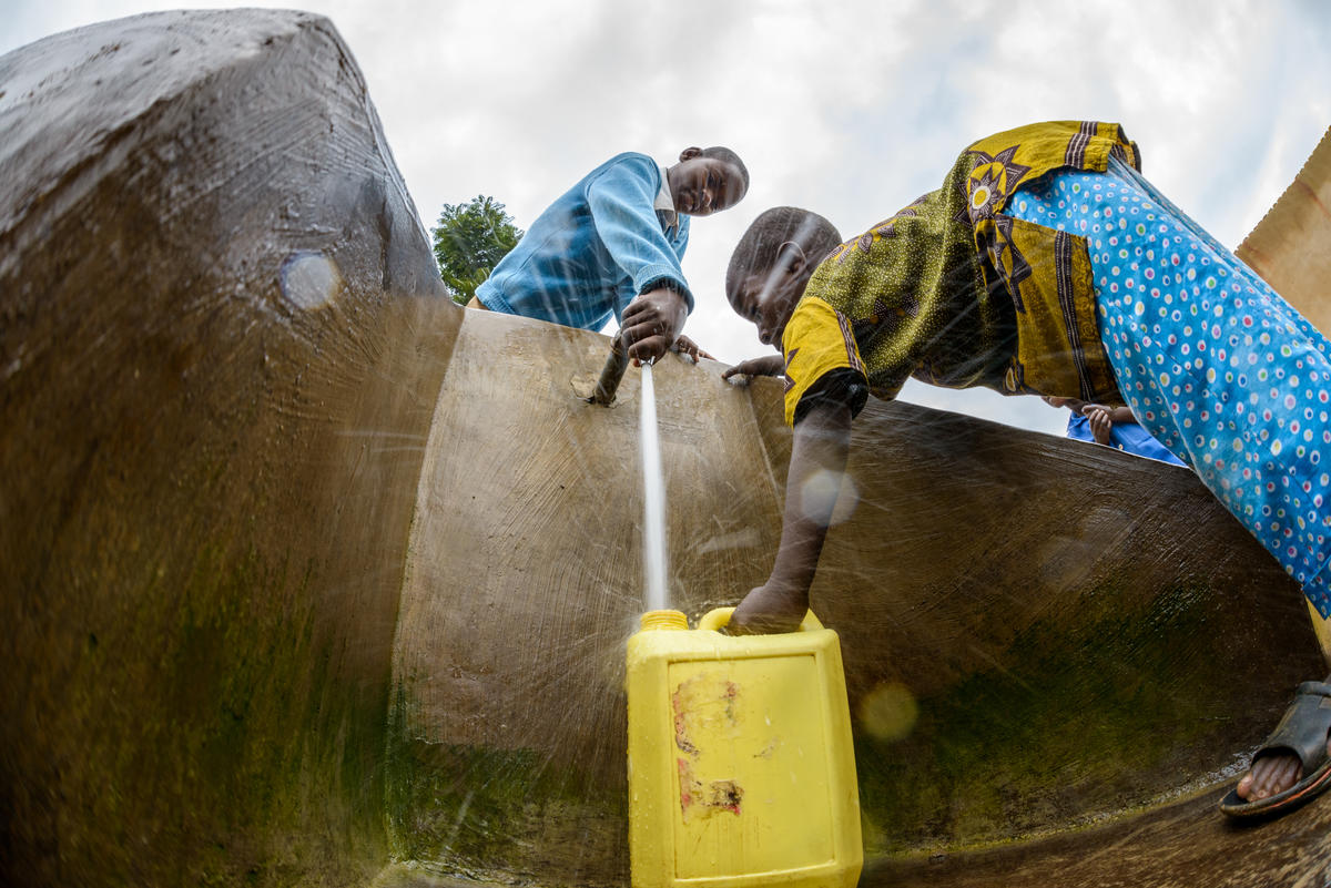 Isabelle at a World Vision water faucet