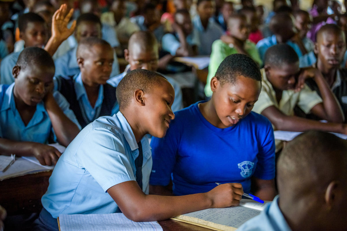 Janet in school in Uganda