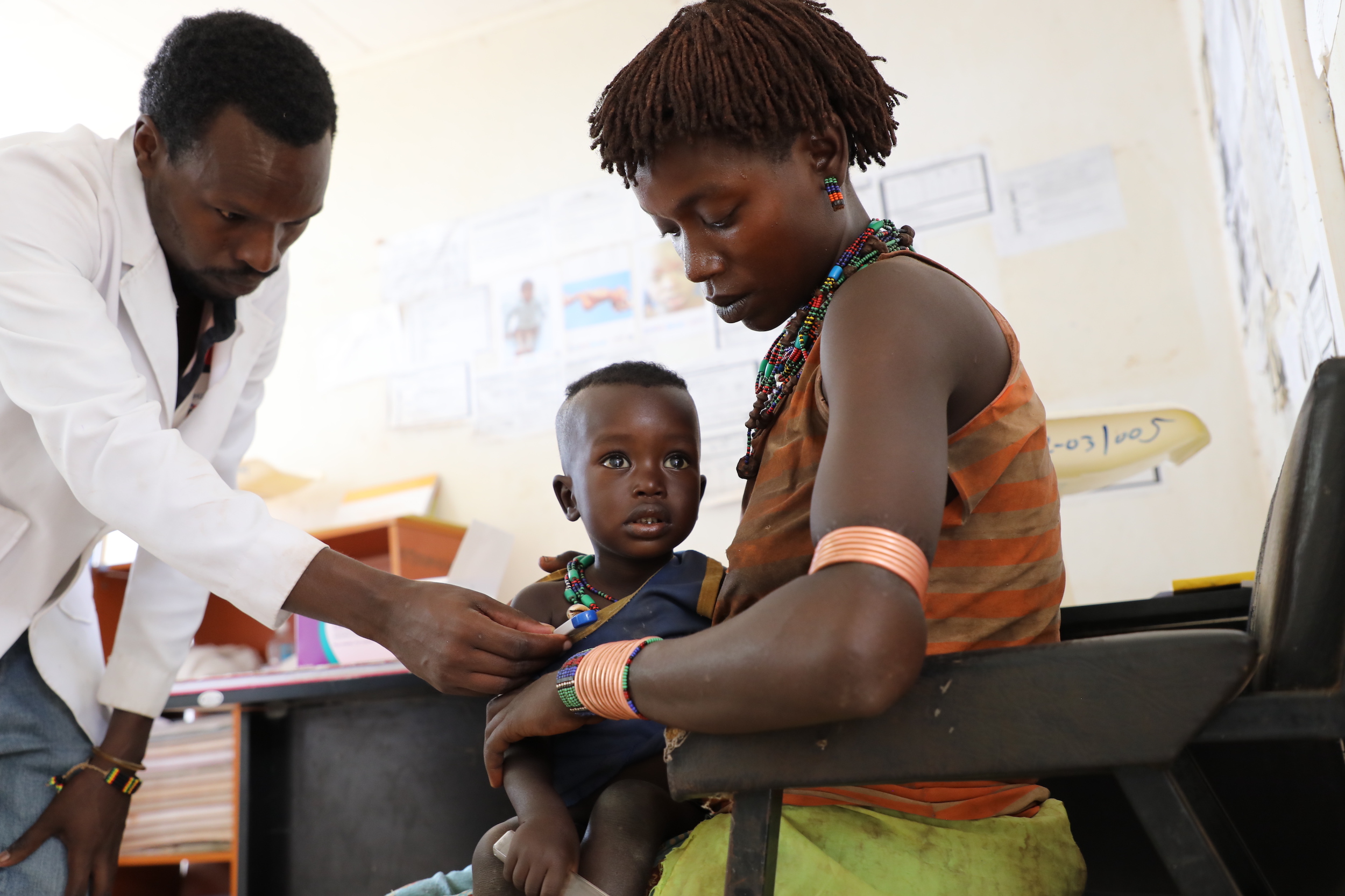 Lito Obo with her son at the health centre