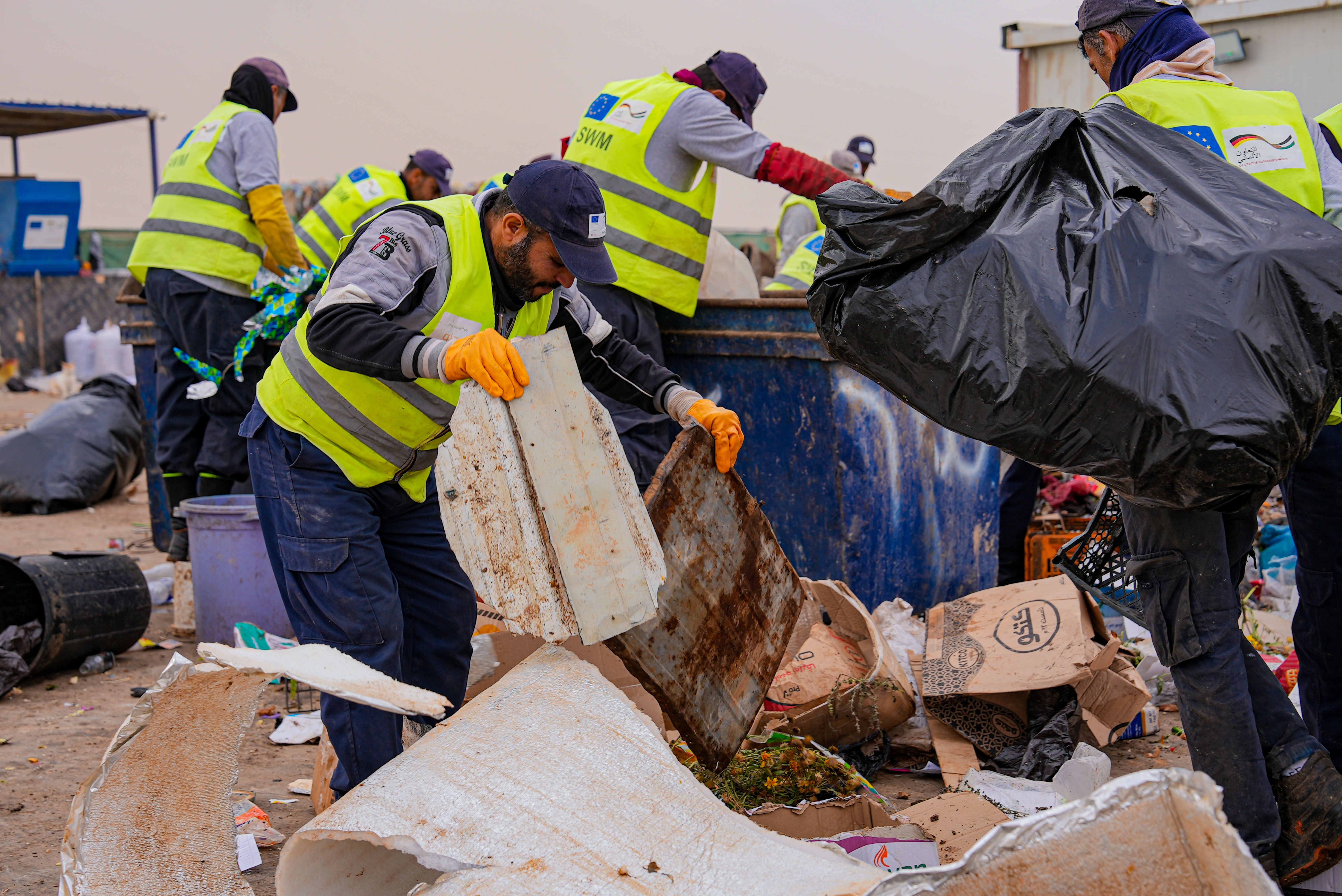 Mohsen during work in World Vision Syria Response Green Centre. He contributes to a clean environment in Azraq Camp as one of the volunteers who separate waste.