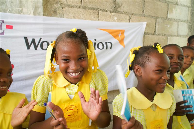 Children take part in an activity at a community event. Haiti/ 2025.