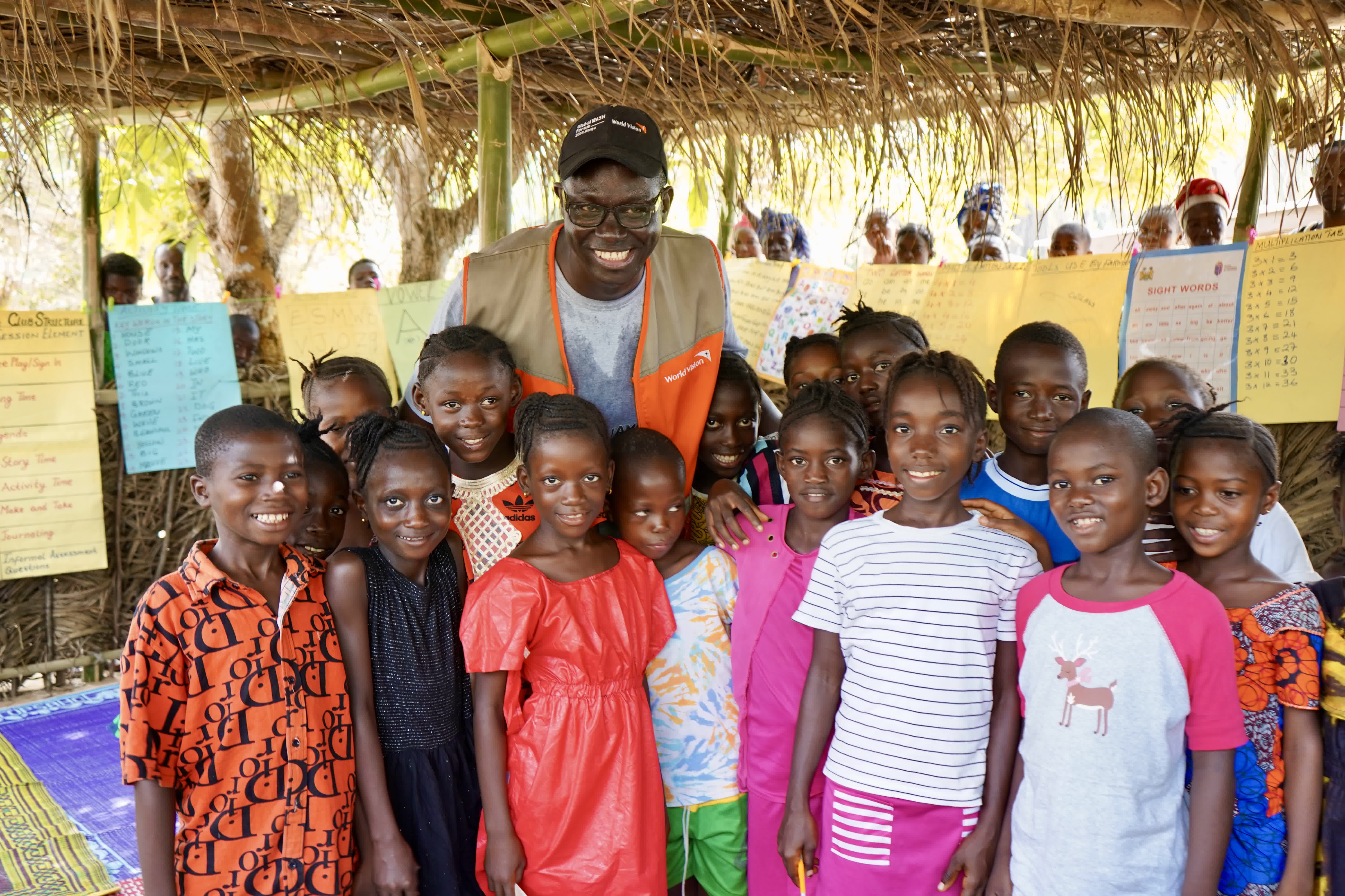 WVISL National Director with Children from the reading club at Yengessa