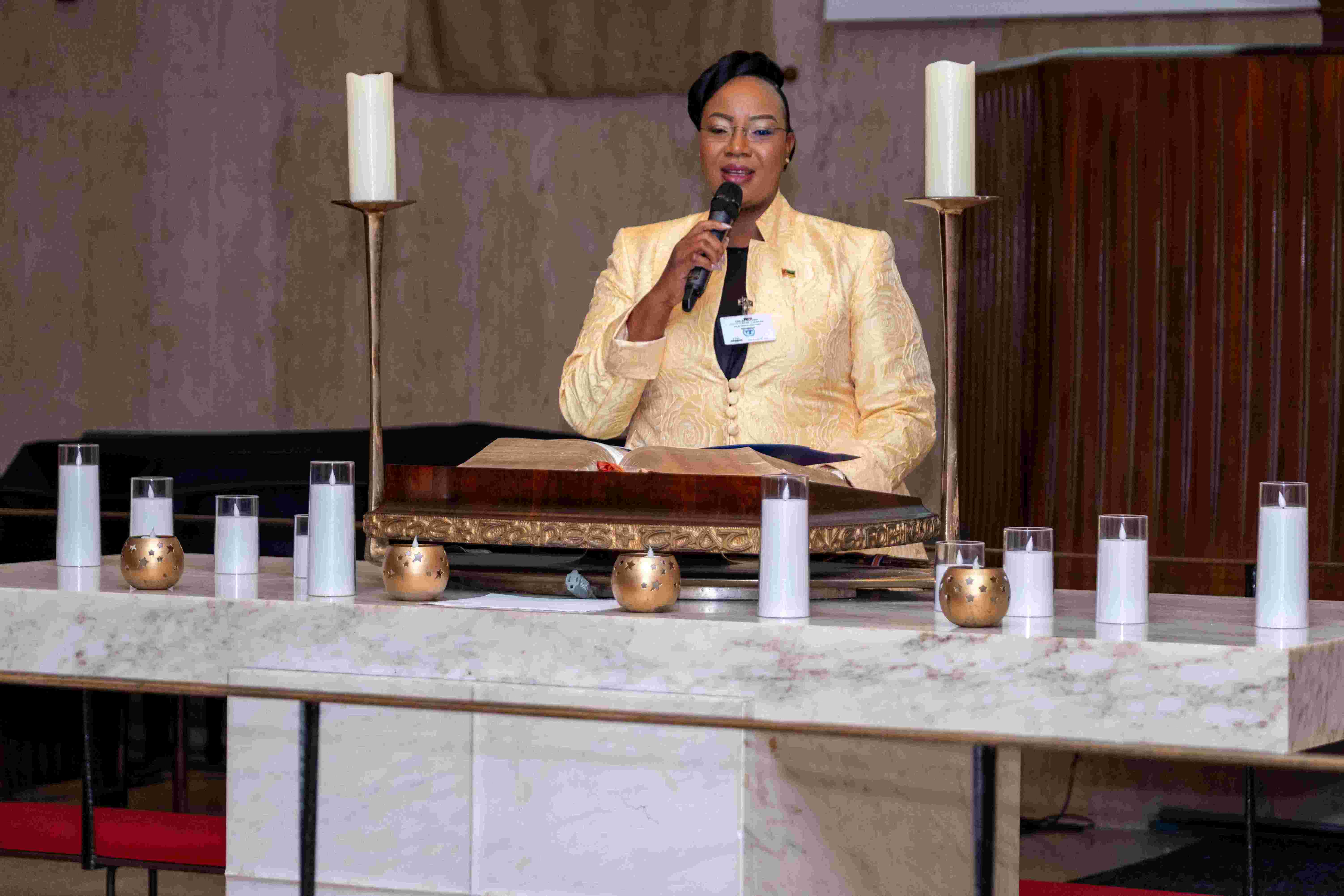 First Lady addressing the prayer service.