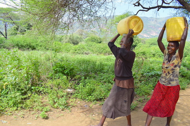 Women used to fetch water in a river flowing through a forest with wild animals that put their lives at risk. ©World Vision Photo/Sarah Ooko.