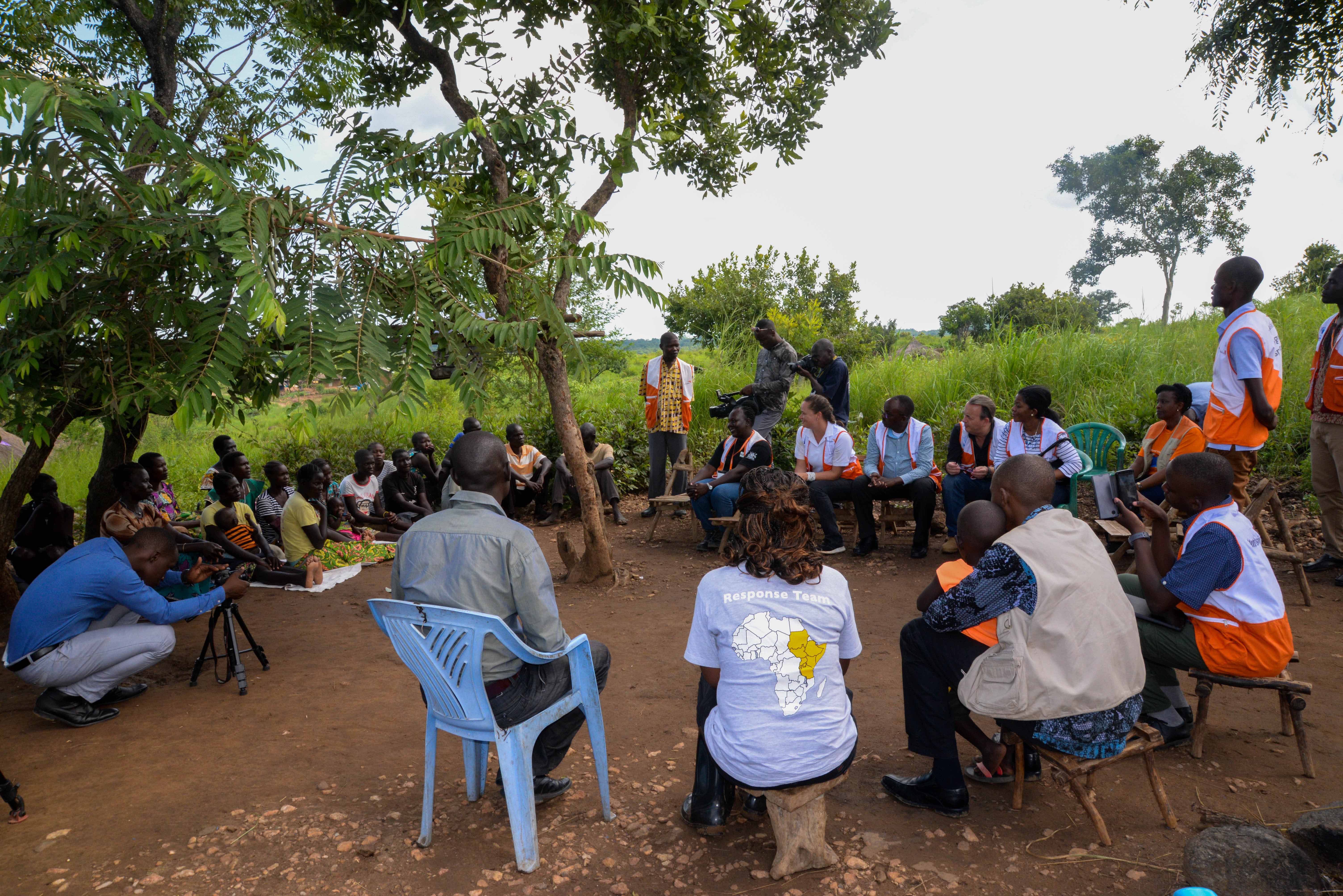 World Vision Team visiting one of the beneficiary groups in Omugo. This specific group received goats and chicken under the animal gift catalogue.