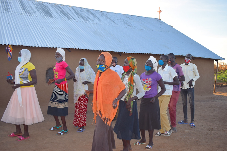 Children singing their hearts out at a community bible camp in Kakuma Refugee Camp.