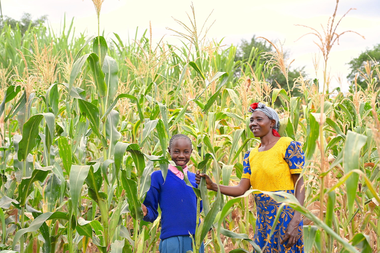 Teresia and her daughter Mercy at their maize farm in Kalawa, Makueni County, Kenya. ©World Vision Photo/Sarah Ooko.