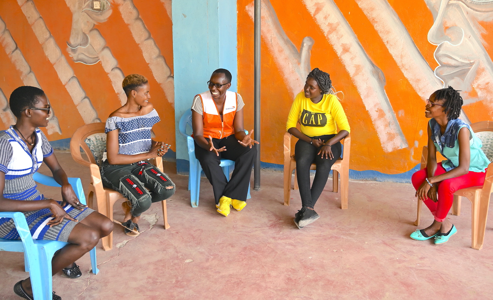 Merab (centre), a World Vision Health Project Officer interacts with HIV peer educators in Turkana County. The organisation, in partnership with Redcross and the government, has been empowering the youth to become HIV prevention champions through funds from the Global Fund. ©World Vision Photo/Sarah Ooko. 