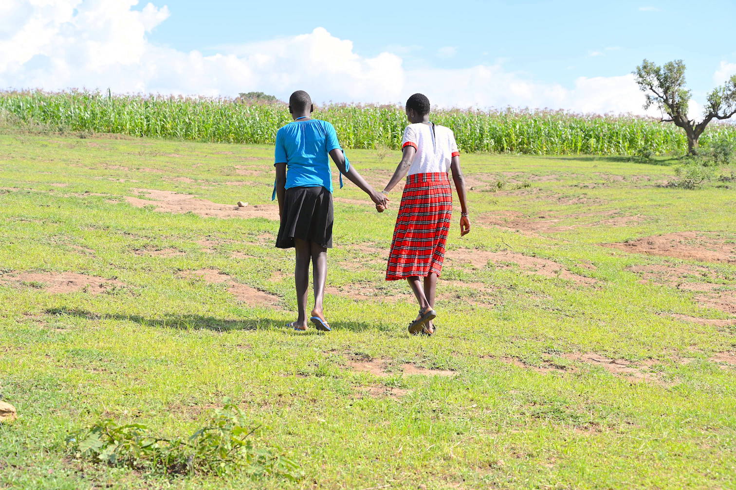 Christine and her daughter Mary having a walk at their home in West Pokot County, Kenya.