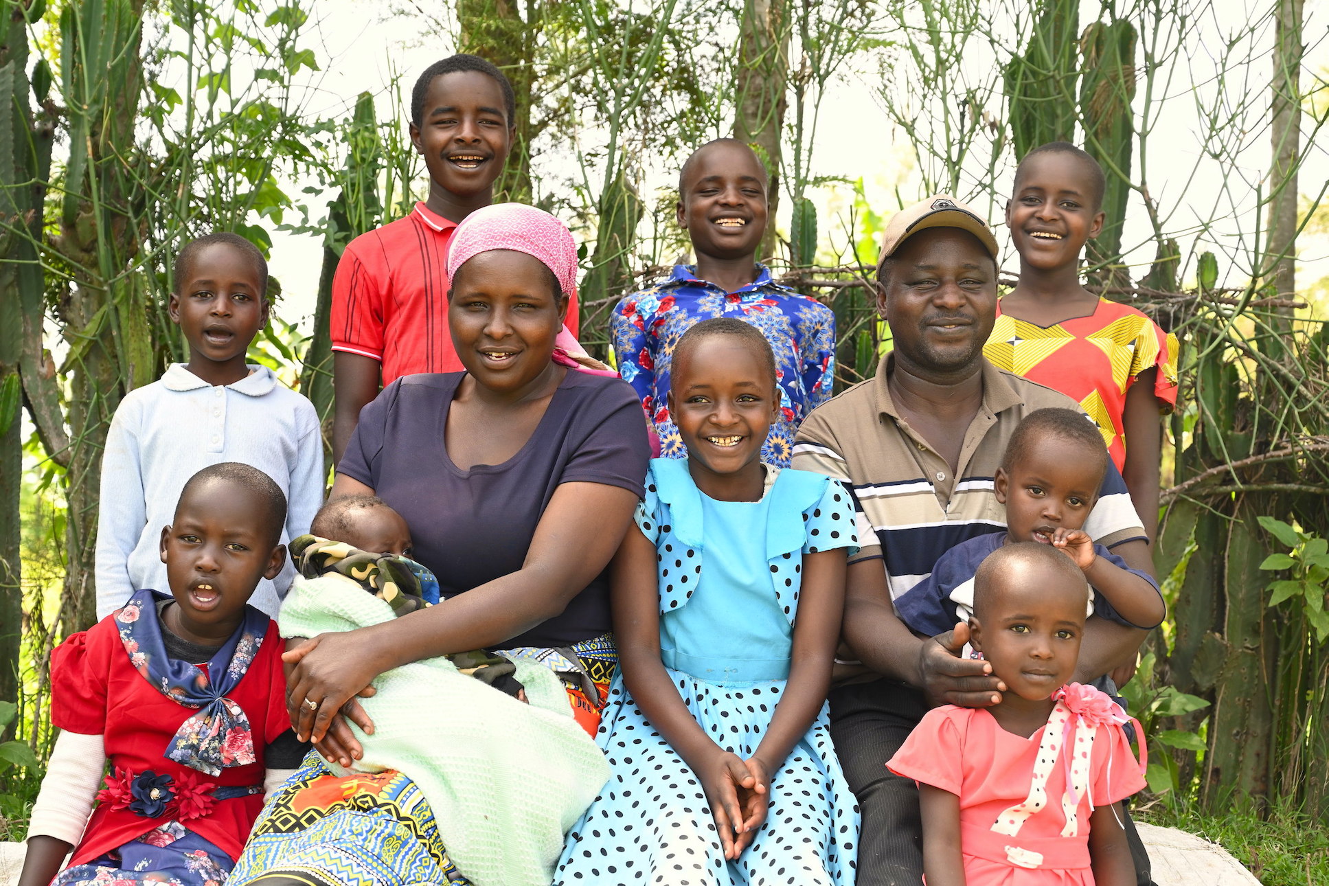 Anita's family is happy and healthy due to improved household food security and income.