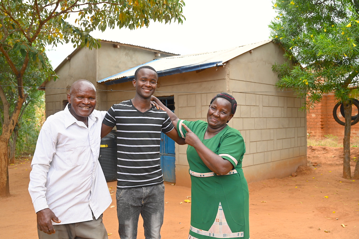 Felista with her husband Charles and son, Leornard. The family used to endure so much suffering due to lack of income. ©World Vision Photo/Sarah Ooko.