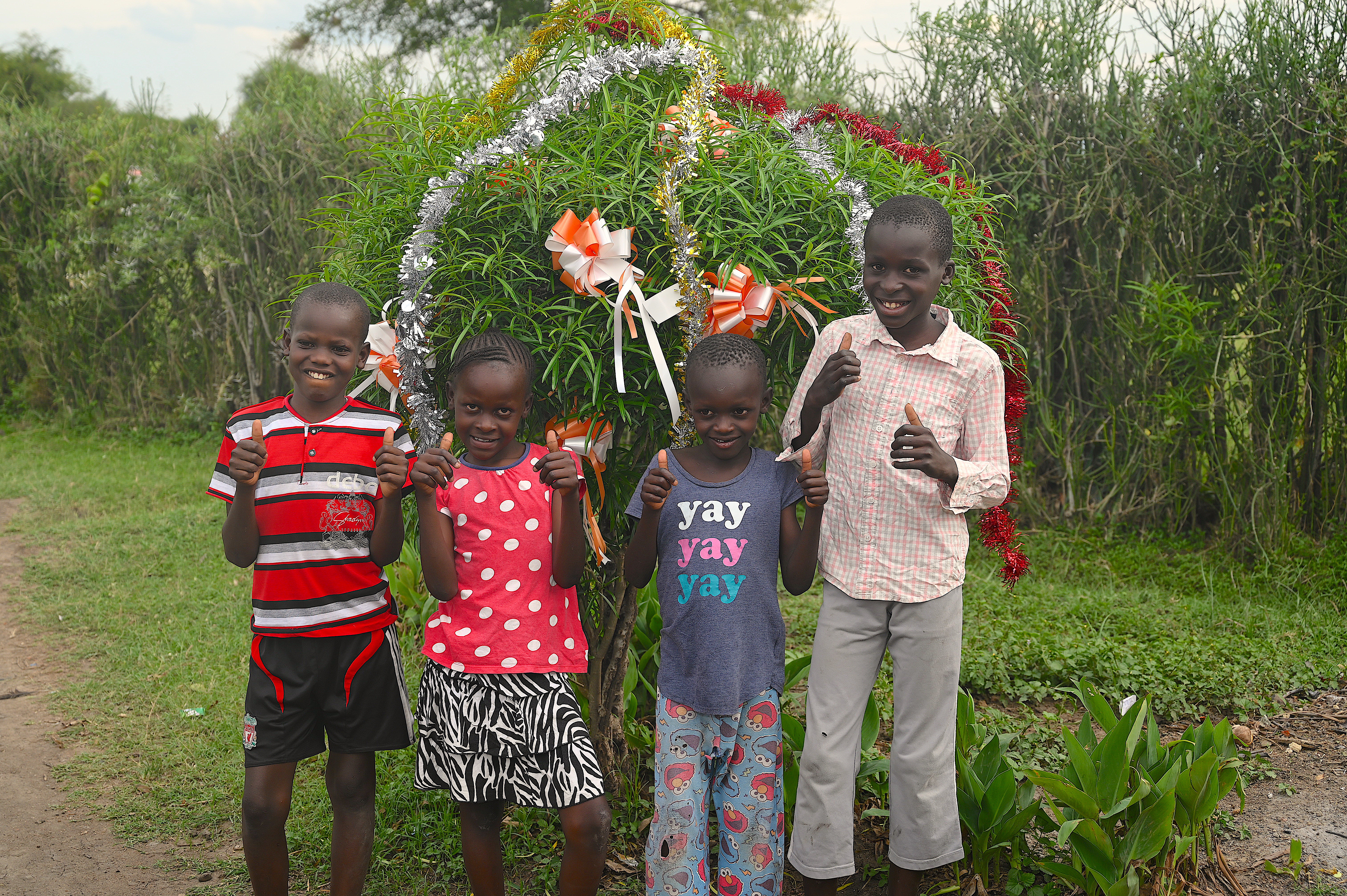 During Christmas, most children usually receive gifts which they are encouraged to share with others.©World Vision Photo/Irene Sinoya