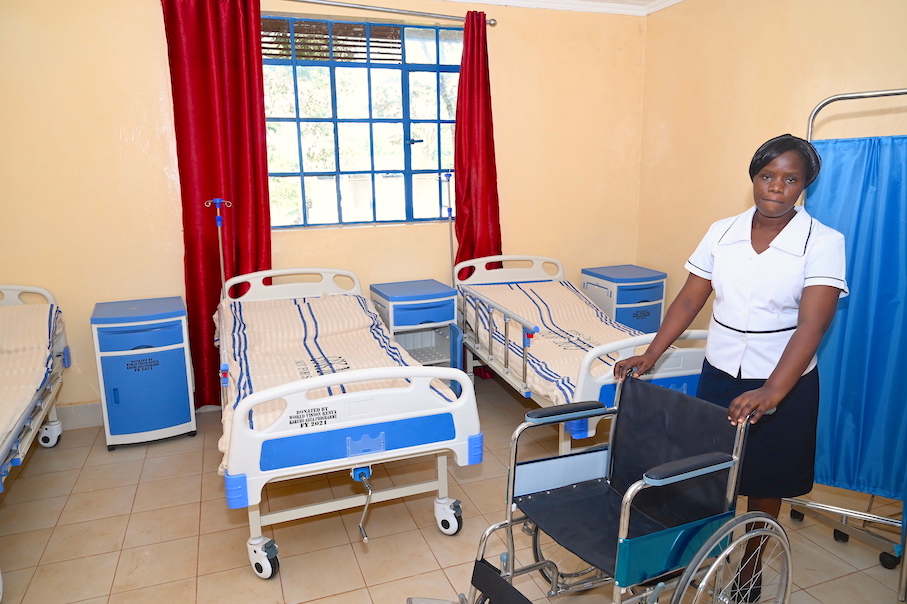 Nurse Adah is delighted that the wheel chairs and hospital beds donated by World Vision will enable her to take good care of her patients