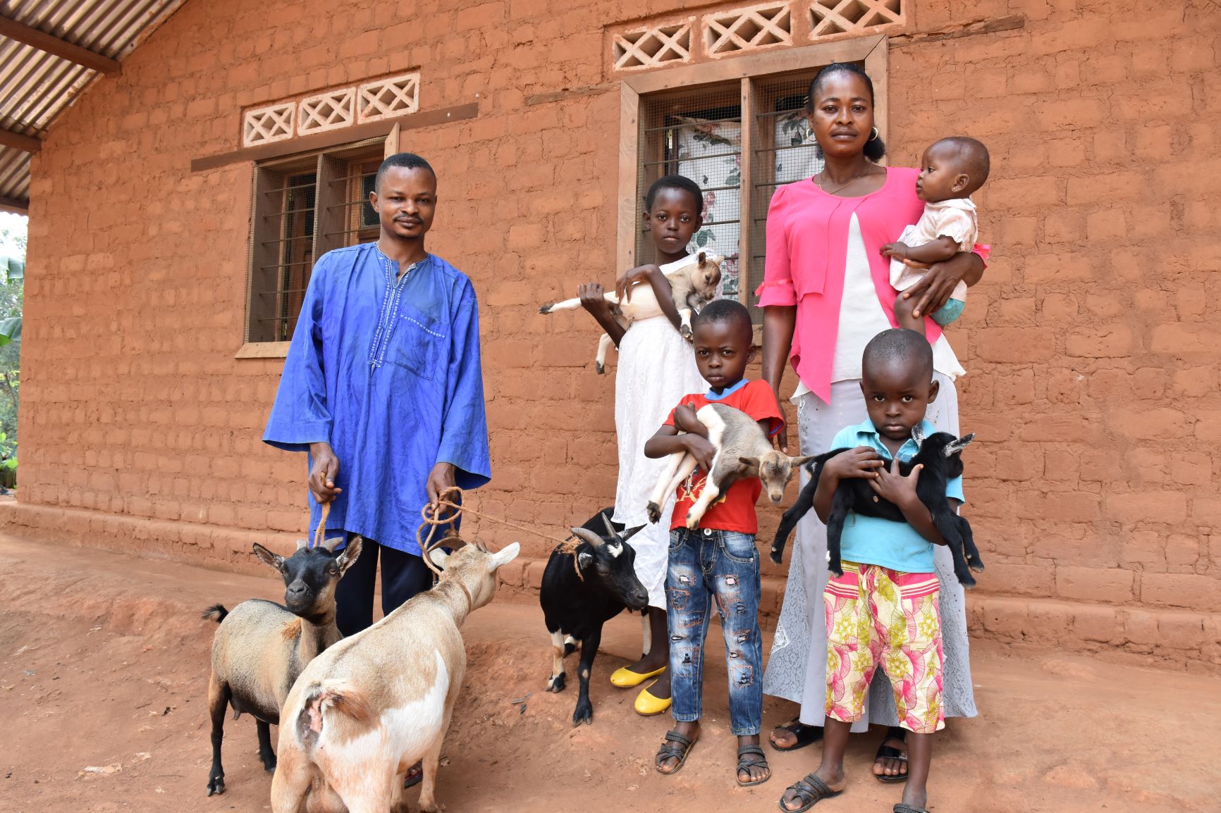 Donnel's family with their goats