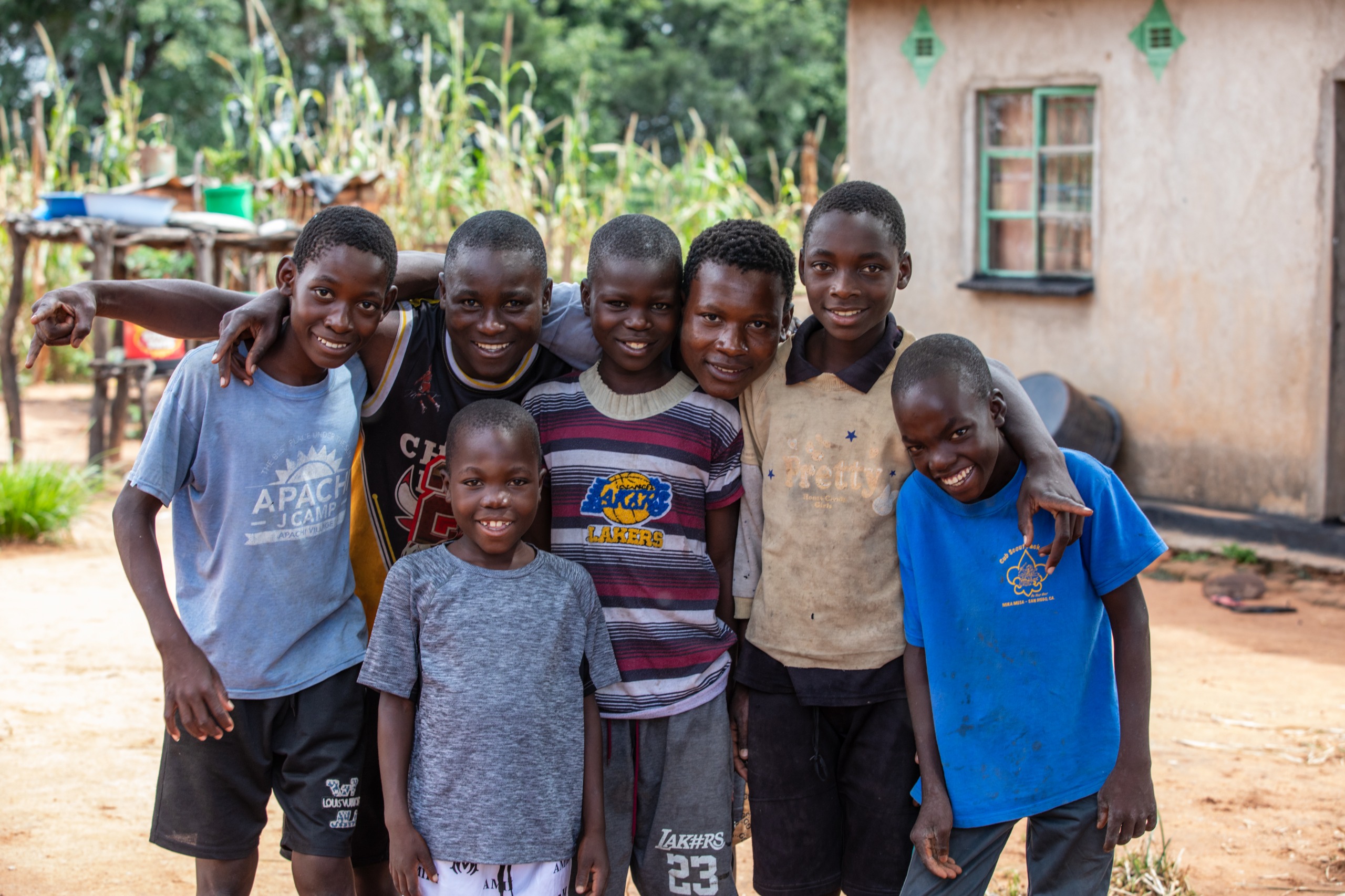 Jeremiah (third from right) is happy about the transformation that has happened in his family