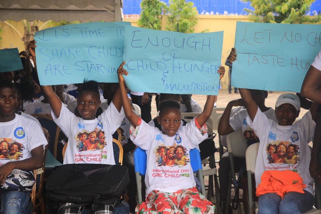 Children holding messages