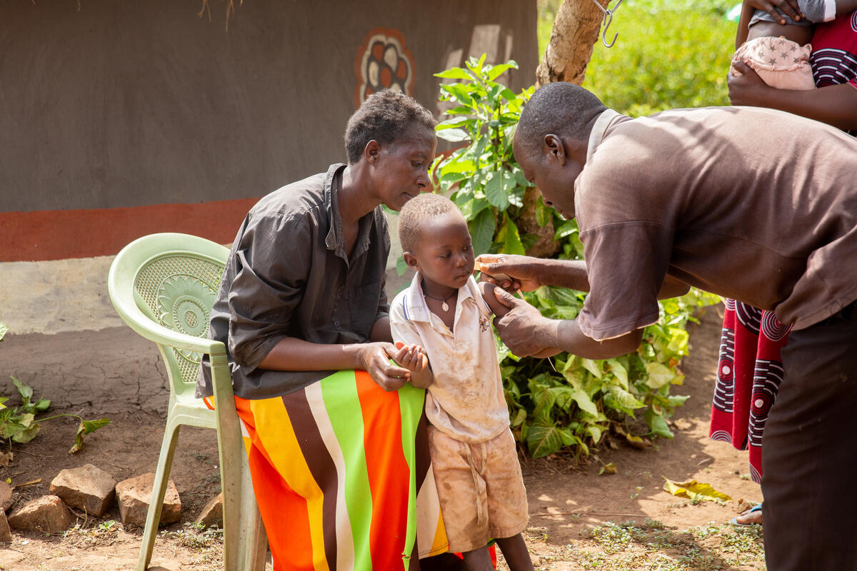 A child receiving his vaccine shot