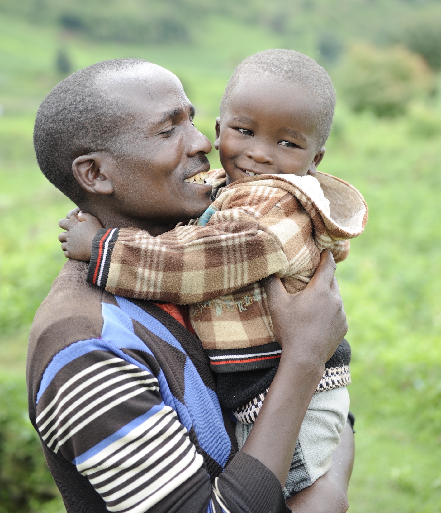 Meshack and his son Rashford. The Men Care Group Sessions have enabled him to embrace fatherhood. ©World Vision Photo/Dickson Kahindi.