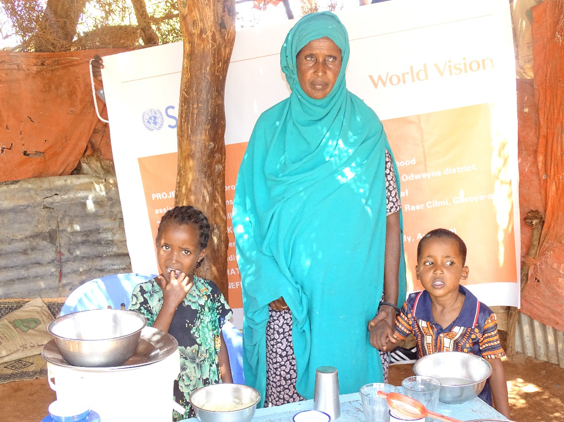 Fatima with her two children