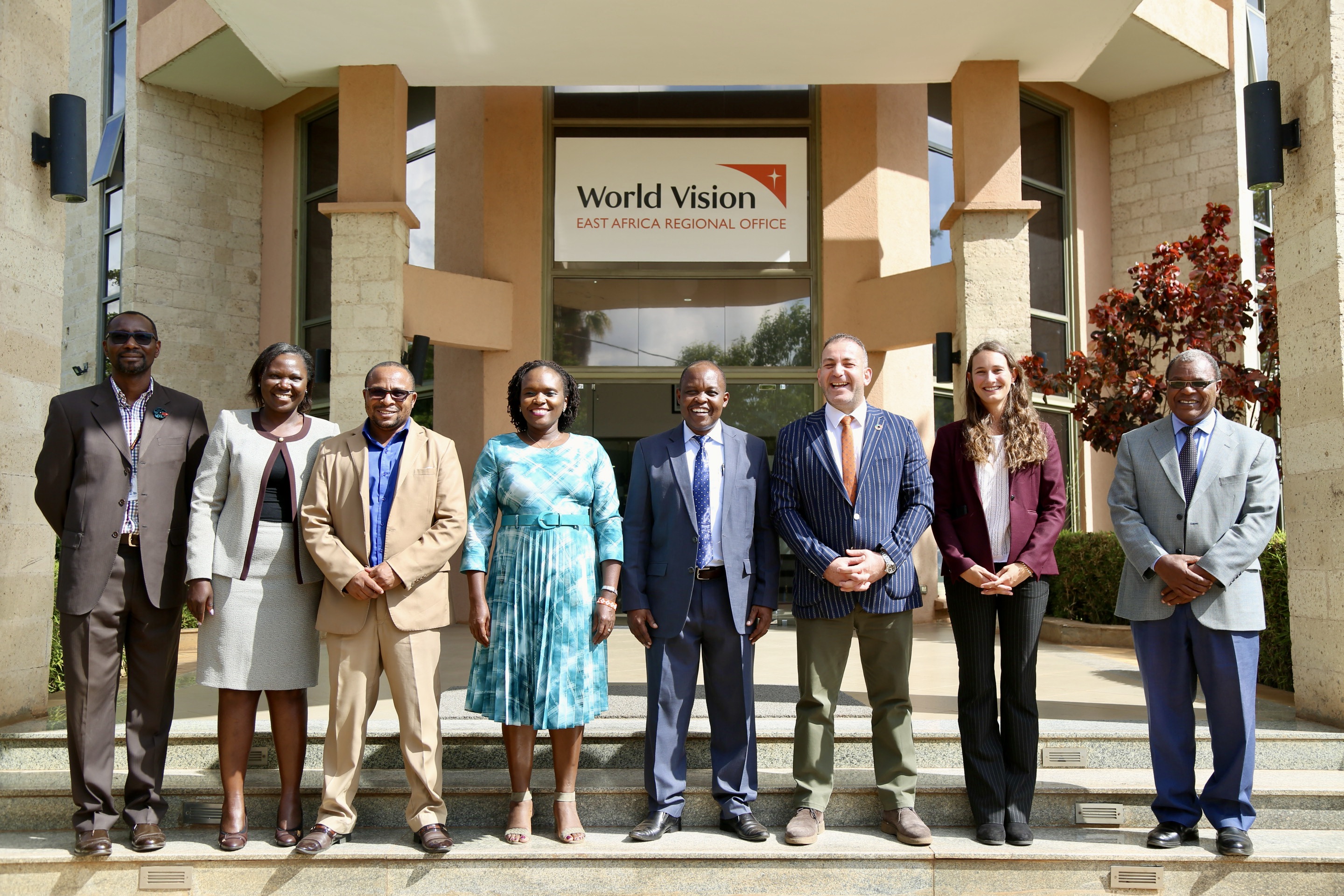 Group photo of the IOM Kenya team and World Vision Senior Leadership team at World Vision Kenya.JPG