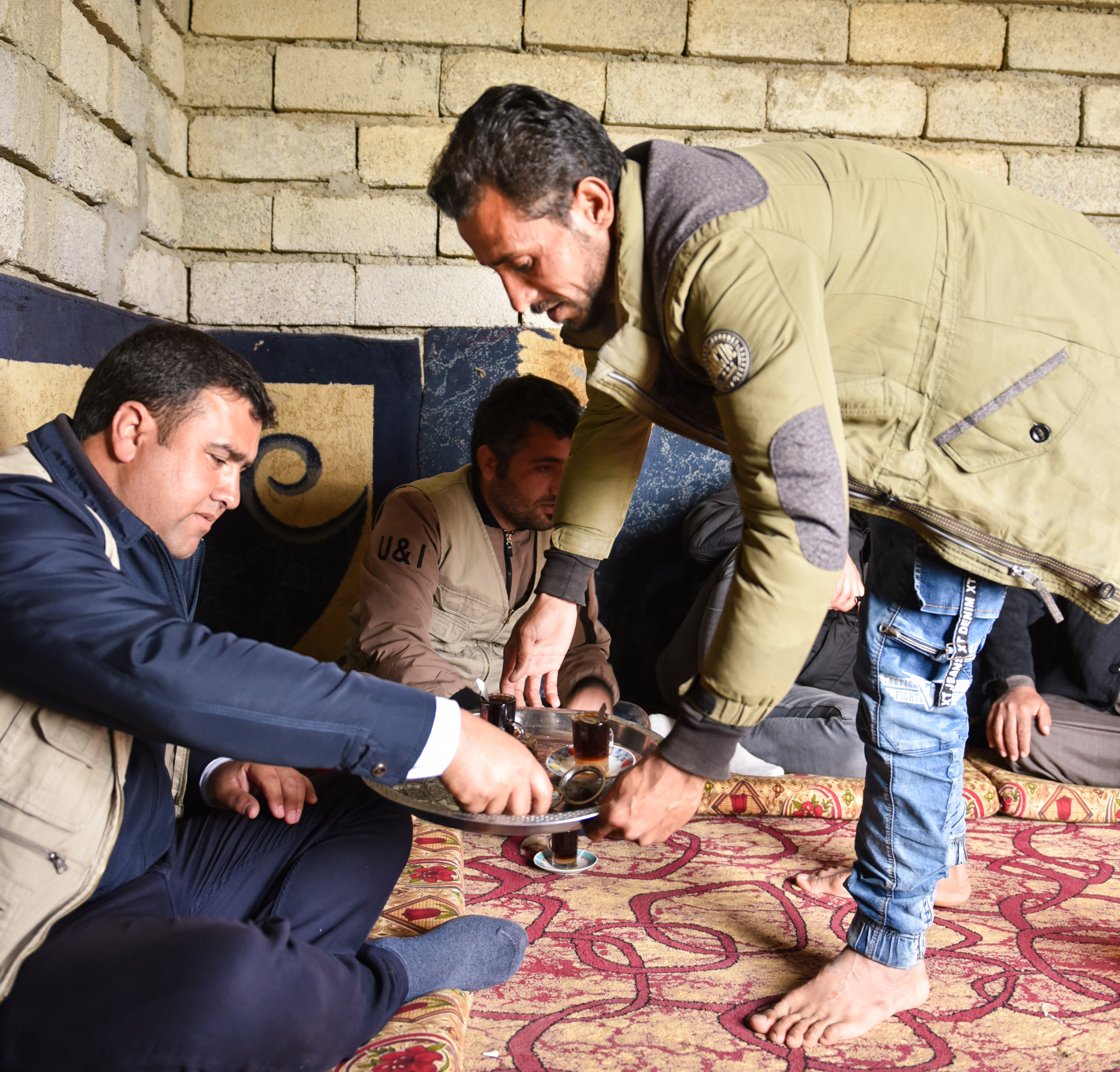 Clean water enables Ahmer to share tea with his guests in Abu Mariya village